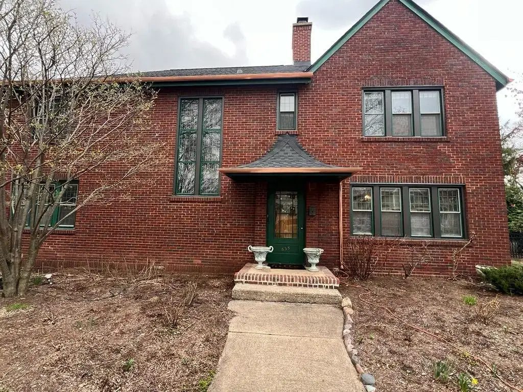 Custom half round copper gutters and twisted downspouts — photo 4