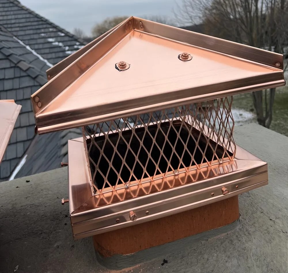 Polished custom copper chimney cap