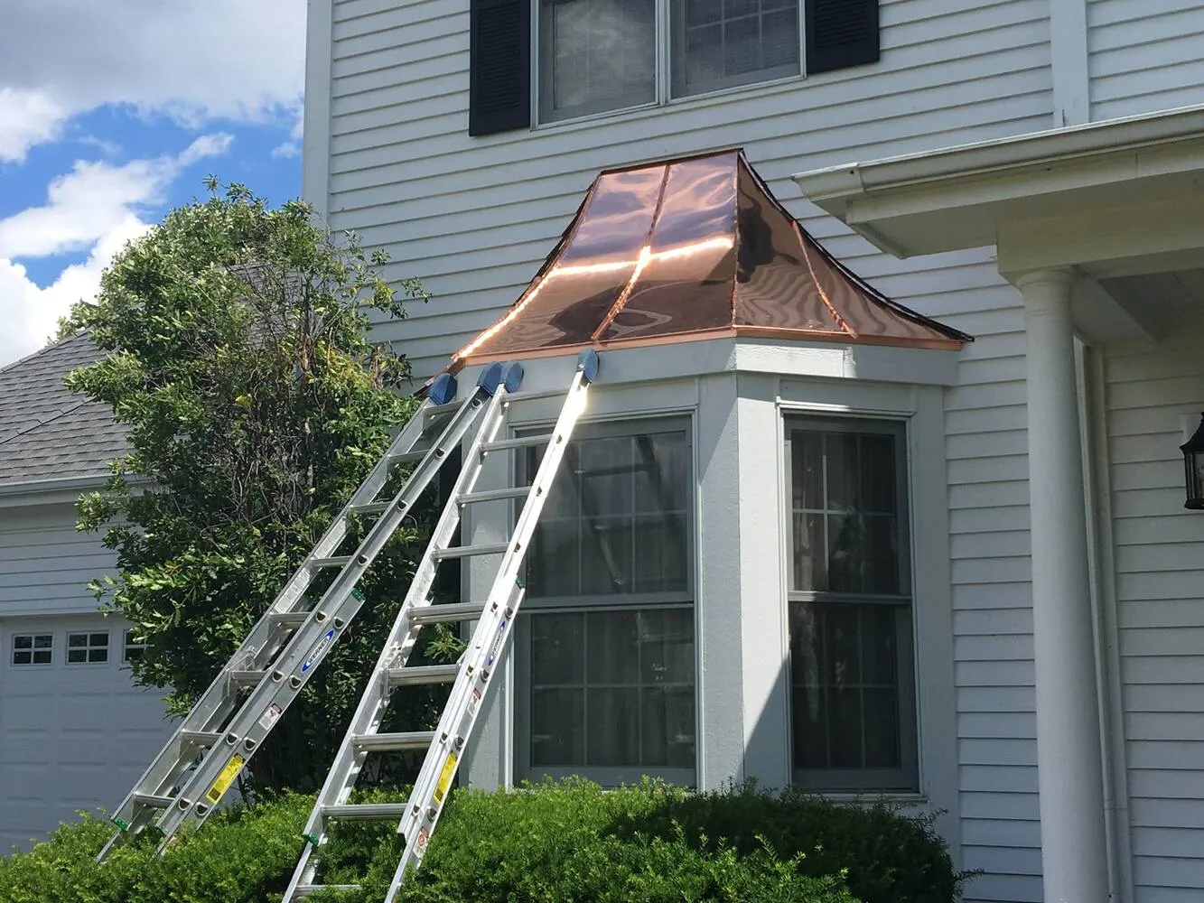 Standing-seam copper bay roof install